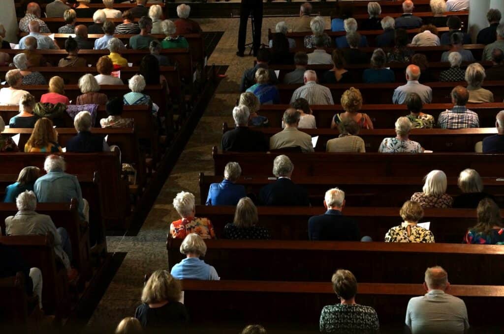 Crowds: the audience at a concert of an oratorium choir in an ancient Dutch church.