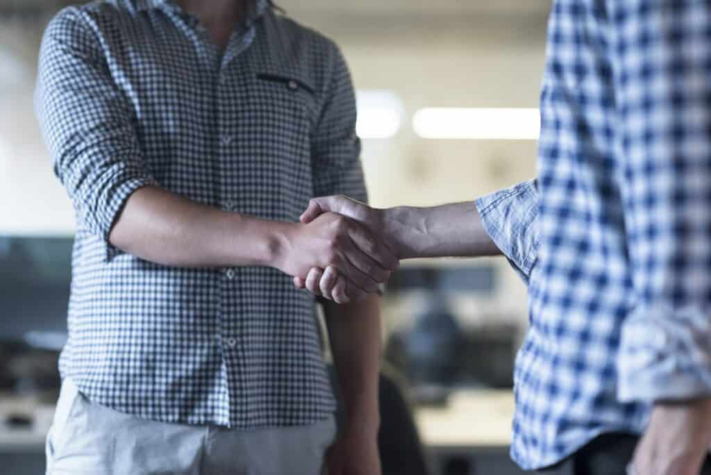 start up business people handshake