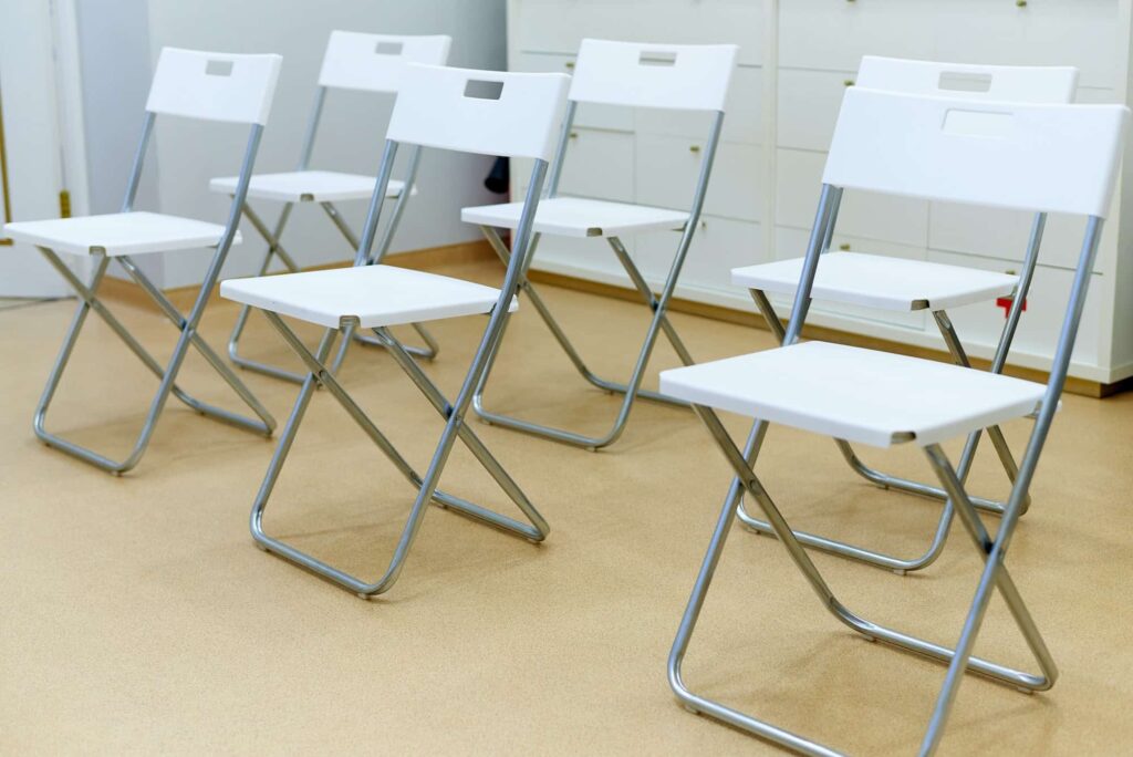 A row of empty chairs in the class